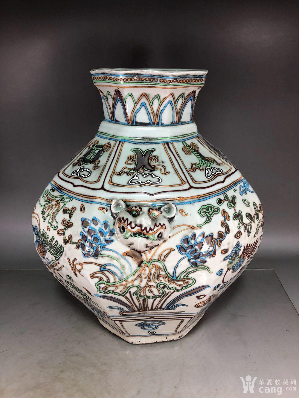 元代五彩堆线条鸳鸯戏水兽头罐