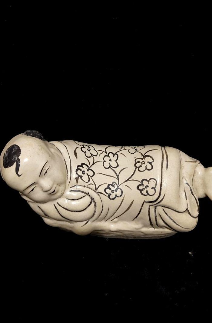 宋磁州窑孩儿枕