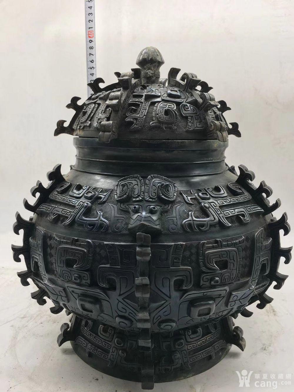 饕餮纹**罐黑漆古