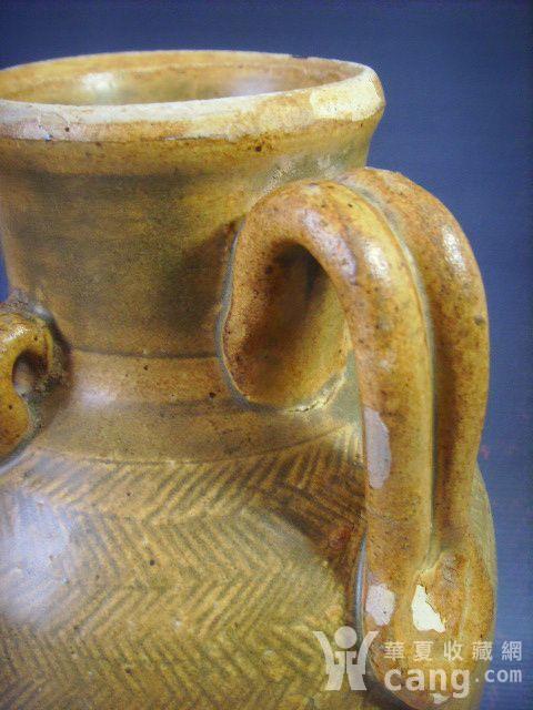 藏品展示 大开门唐黄釉席纹注子，高18厘米。略有脱釉，完整。 述