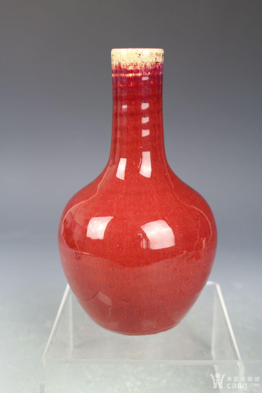 瓷器 明 清中期红釉天球瓶 清中期红釉天球瓶,高18cm,腹径10.