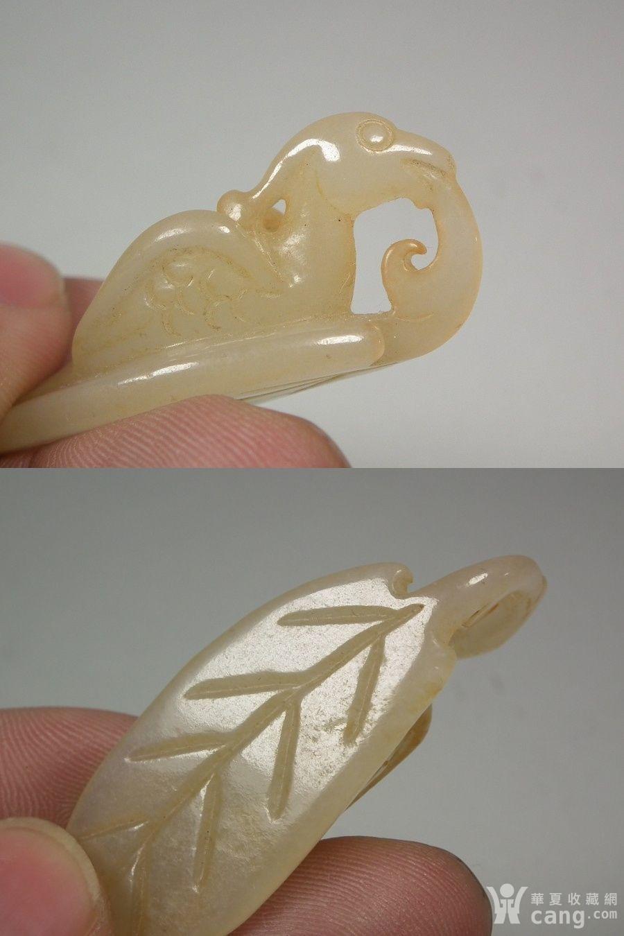 老和田青白玉带红沁圆雕凤鸟小挂件