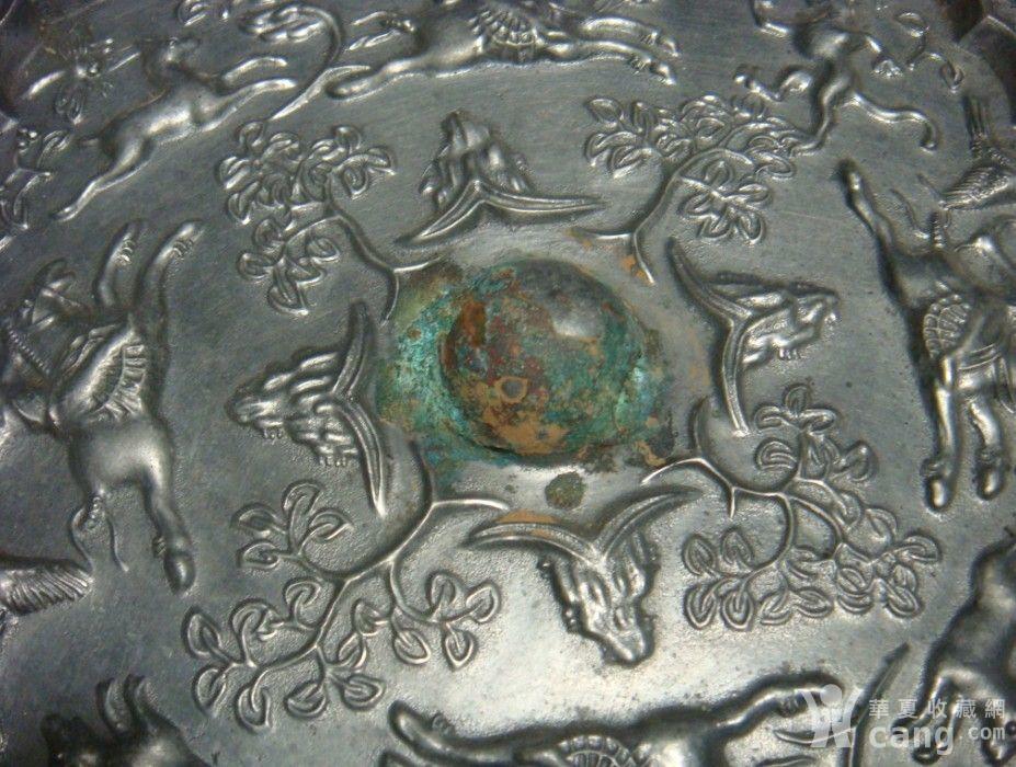 唐葵口八角狩猎镜