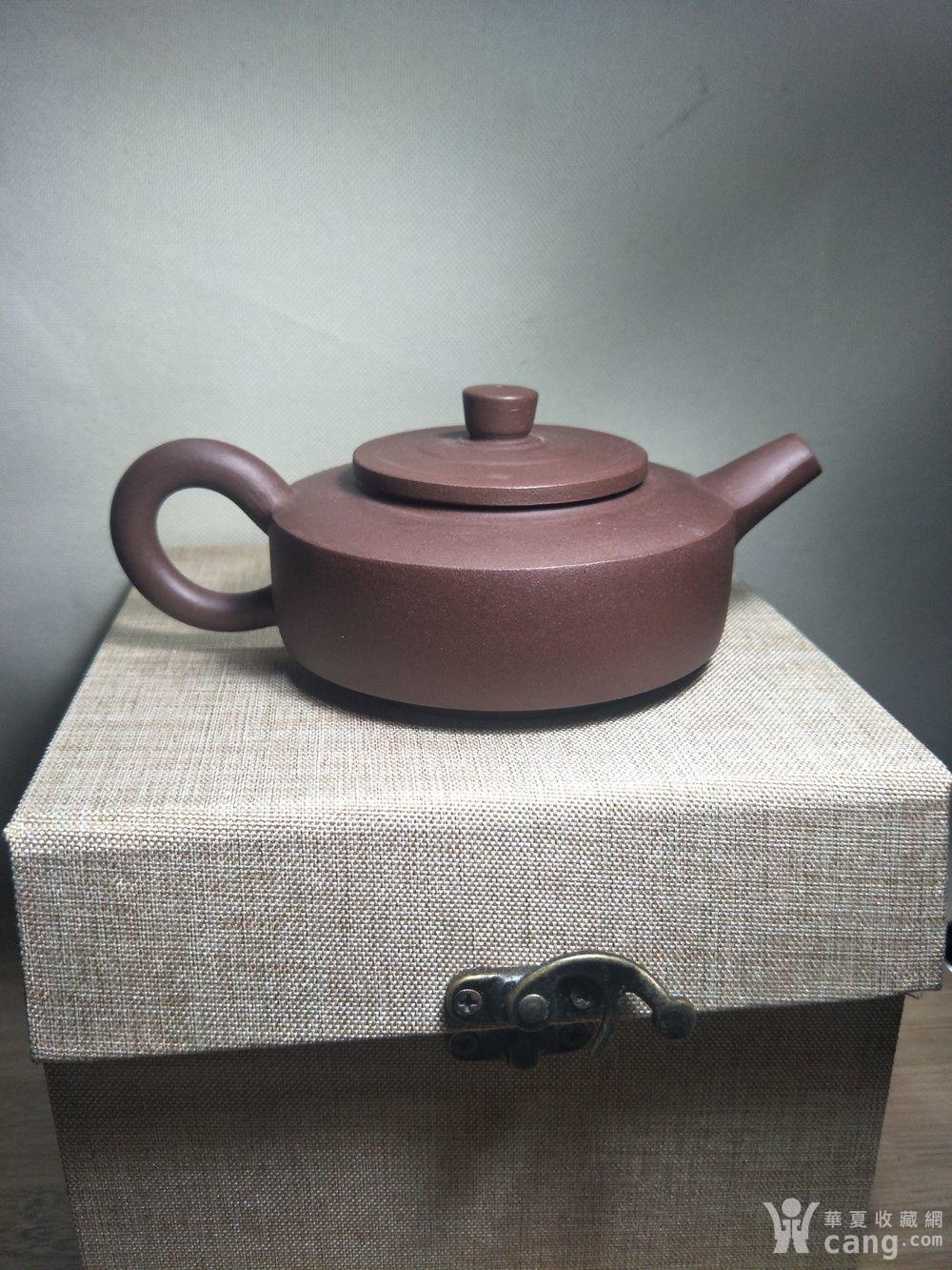 一把小周盘紫砂壶