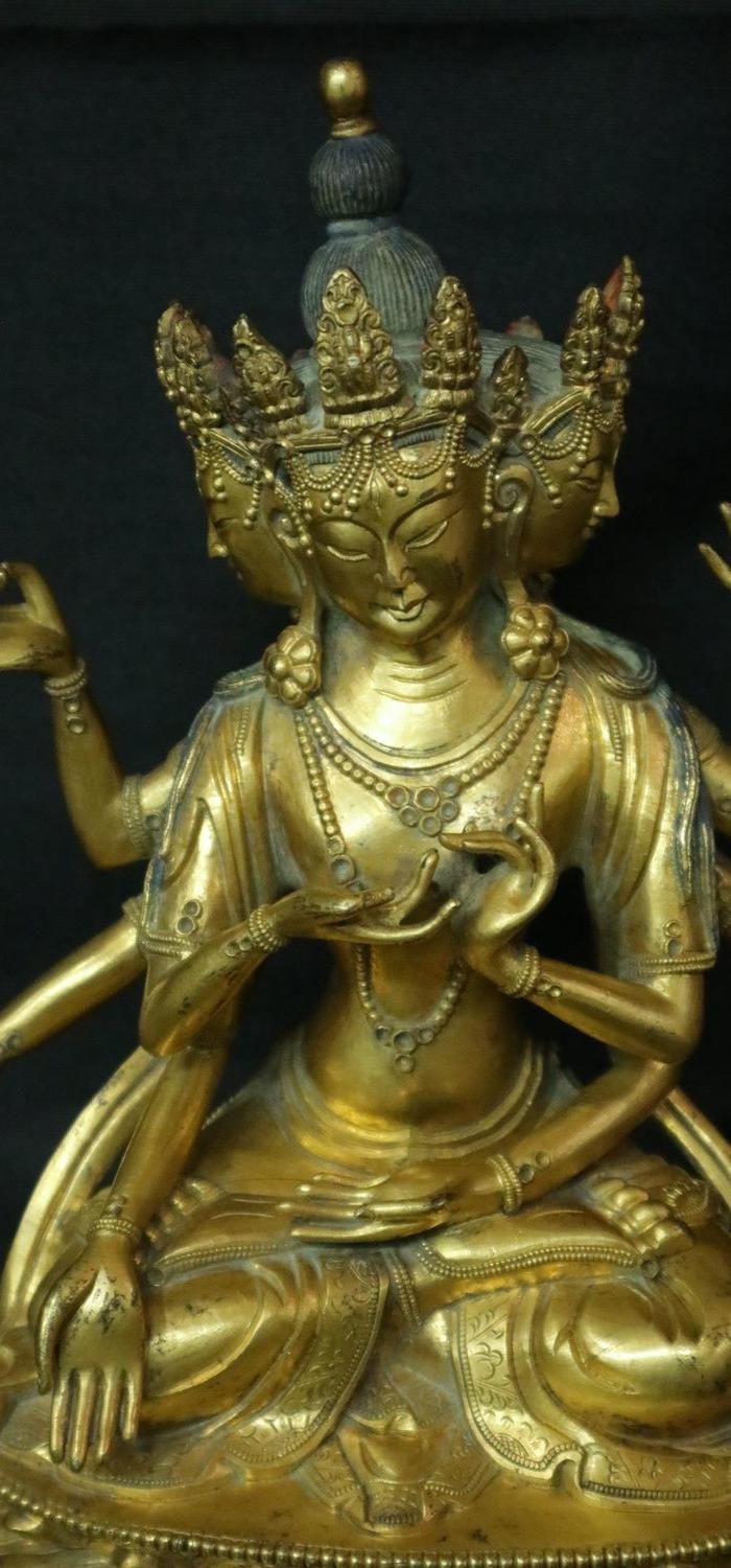 鎏金三头八臂观音