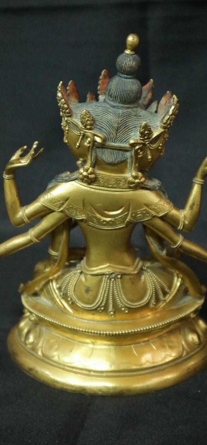 鎏金三头八臂观音